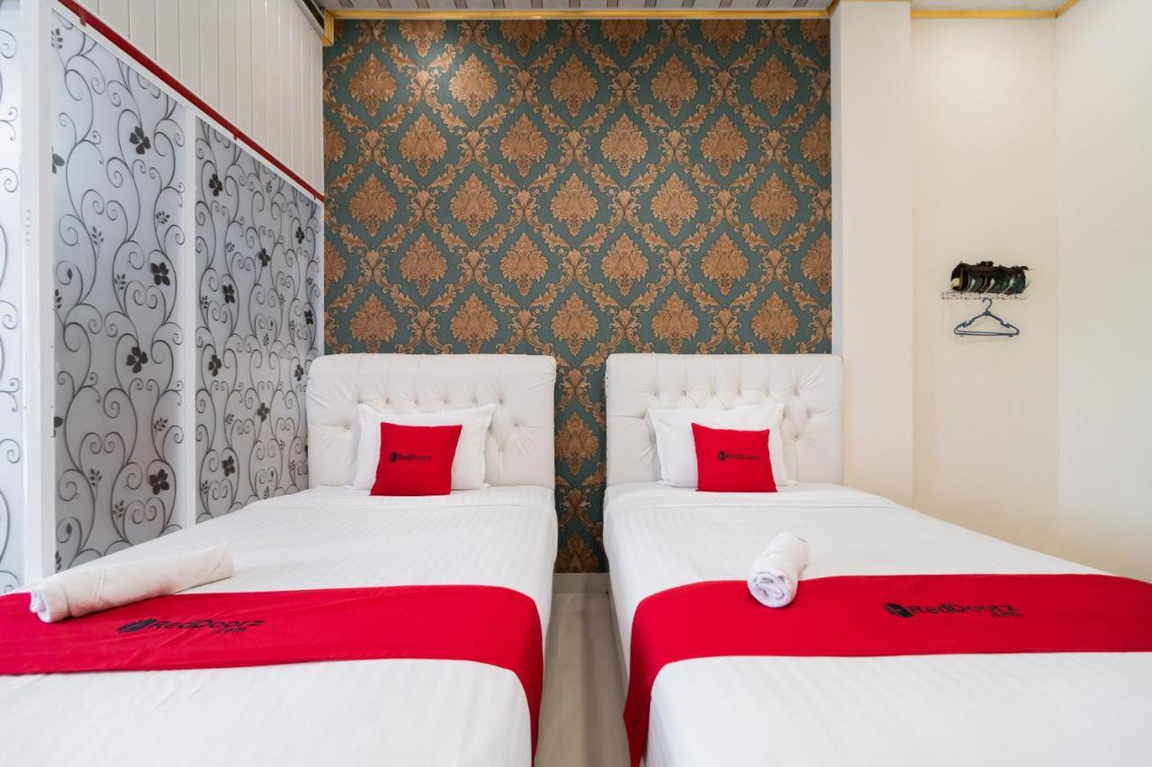 Отель Reddoorz Syariah Near Minangkabau International Aiport Паданг Экстерьер фото