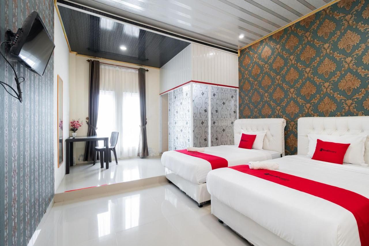 Отель Reddoorz Syariah Near Minangkabau International Aiport Паданг Экстерьер фото